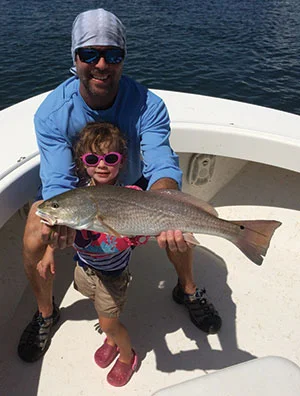 Dr. Hackney and Lily fishing