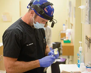 Dr. Hackney adjusting a custom impression tray