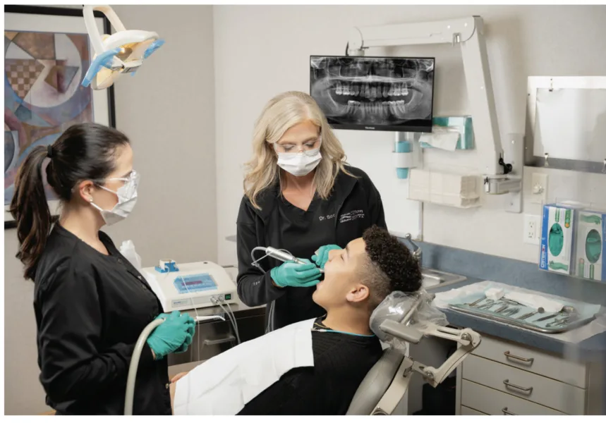 dr. lindsay scoggins with a patient